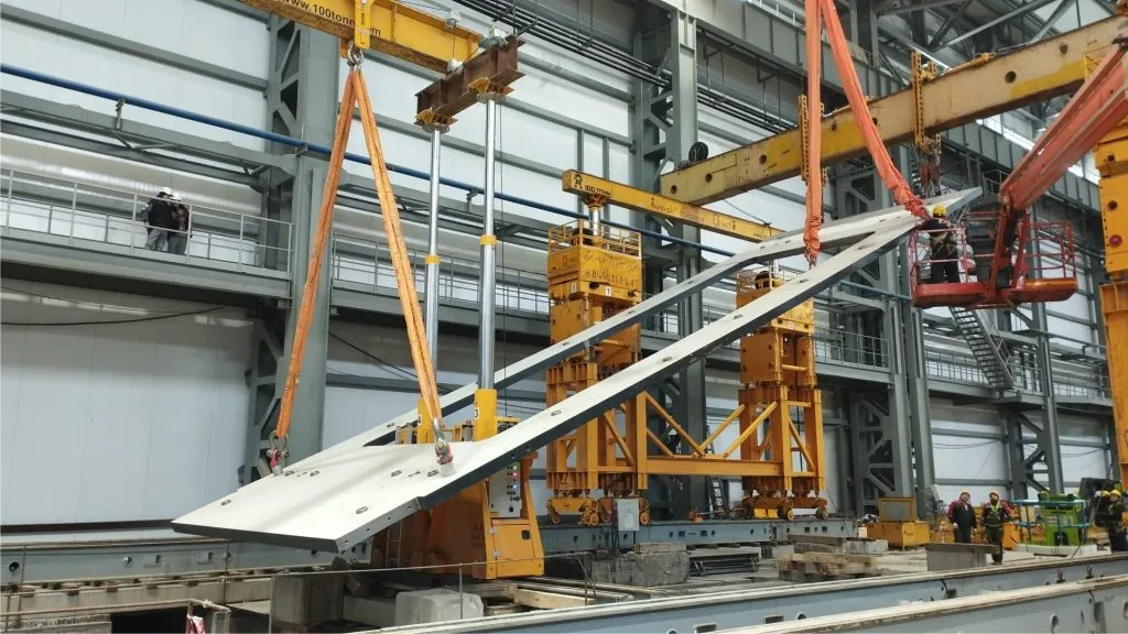 Кантование пластины тяжелого пресса Schuler MH-10000